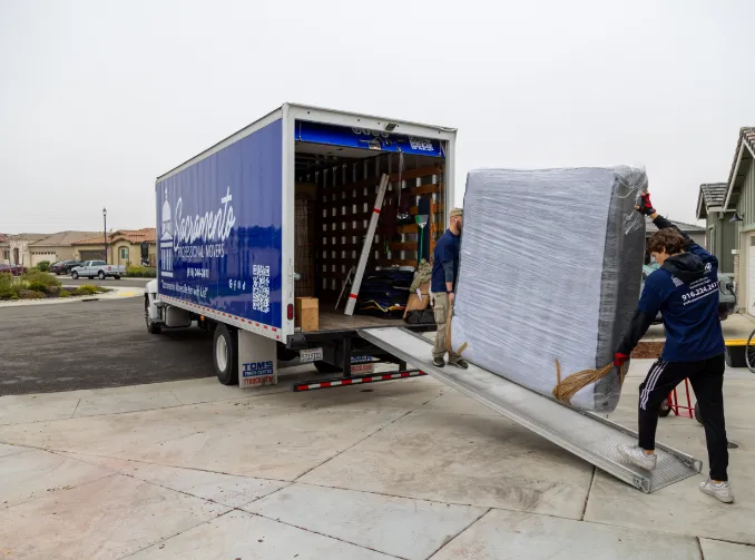 Movers loading a truck