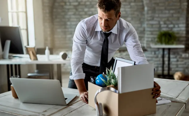 Office worker moving his items