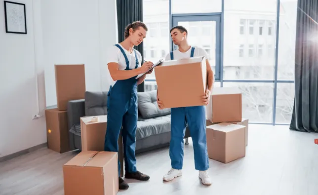 Movers checking a checklist