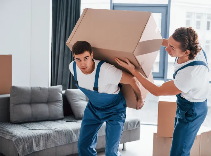 Mover carrying a box on his back